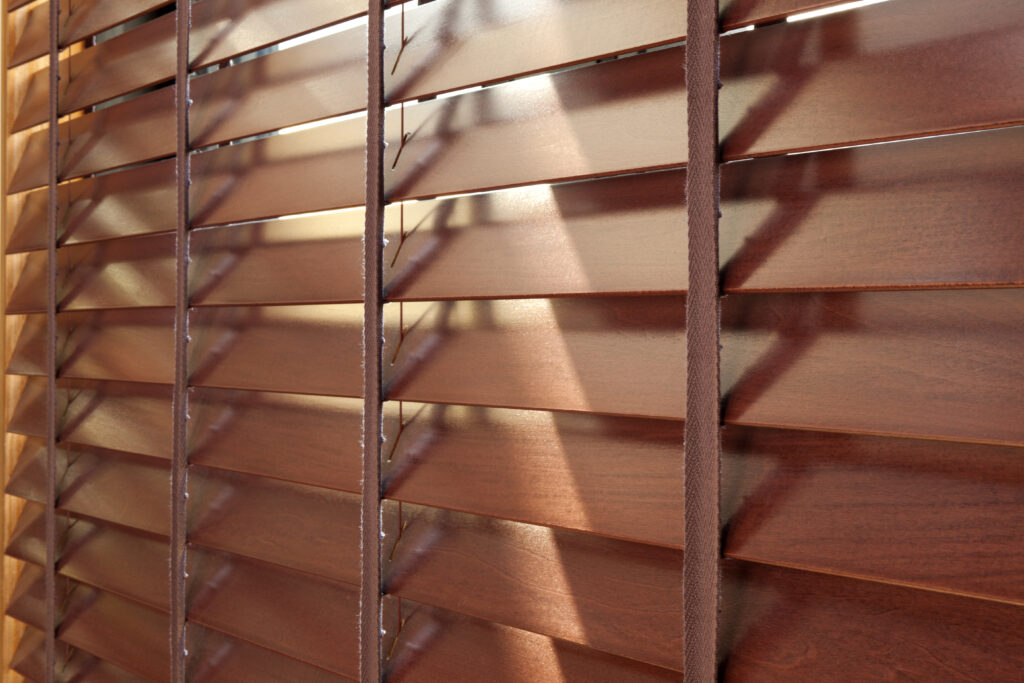 a close up of brown blinds