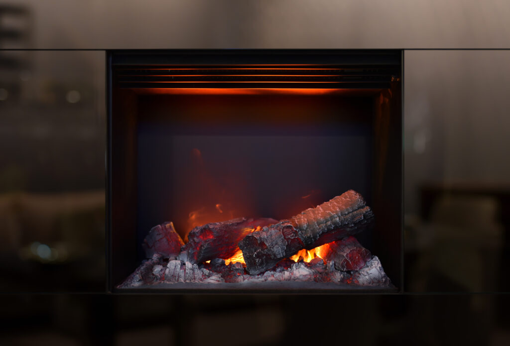 A glowing electric fireplace